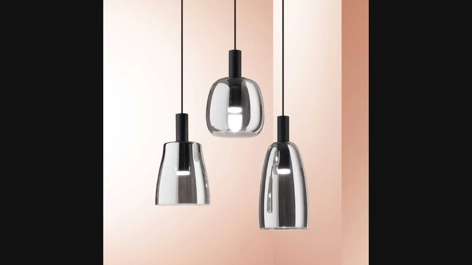 Lampada a sospensione Coco in vetro soffiato trasparente con finitura fumé di Ideal Lux