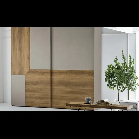 Armadio con anta scorrevole Remix in materico cemento e materico nodato chiaro di Tomasella