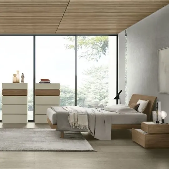 Letto in materico noce ambra con testiera Narciso di Tomasella