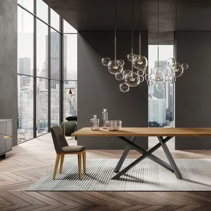 Sedia Nesty2 in pelle con gambe in legno di FGF Mobili